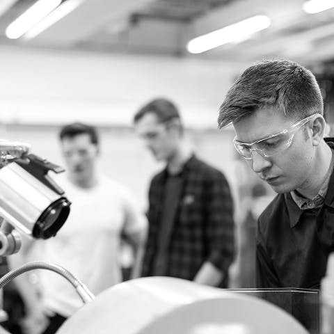 Clearworld team member working with safety glasses on